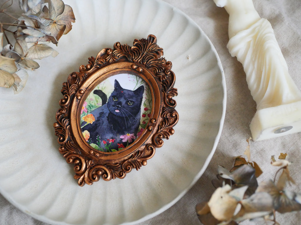 Black cat with lady bug | Mini Vintage-Style Framed Art Print