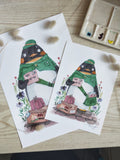 Watercolour illustration of a penguin postman carrying letters