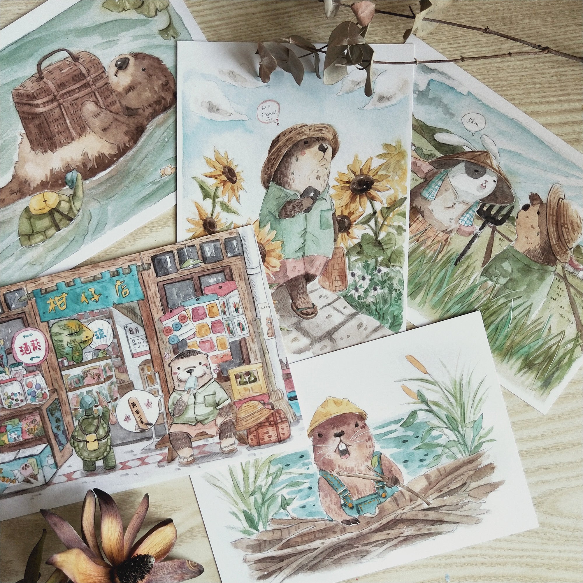 Set of five Mr. Otter watercolour prints hung together as a gallery wall
