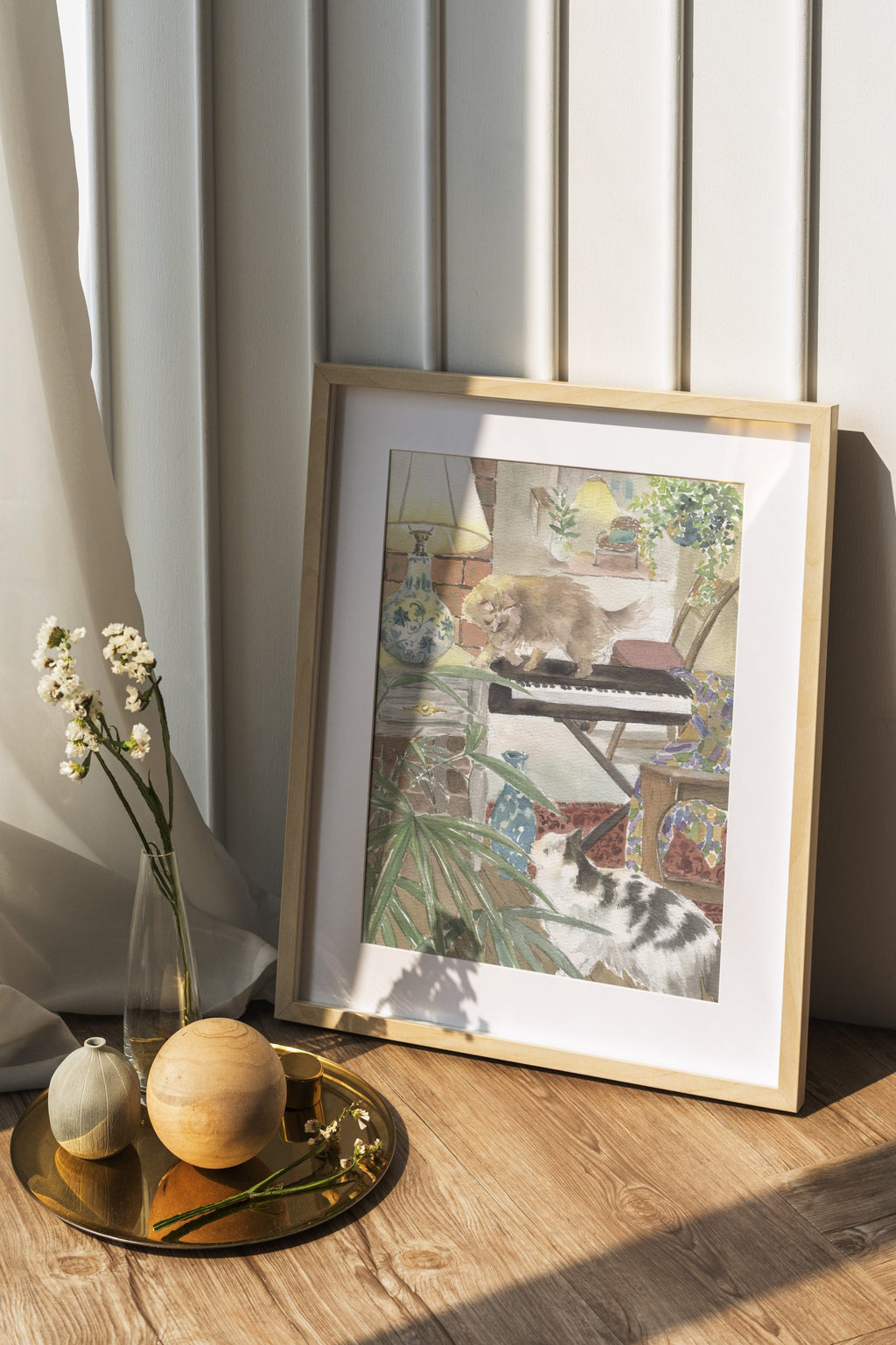 Piano and Cats giclee art print shown framed on a wall
