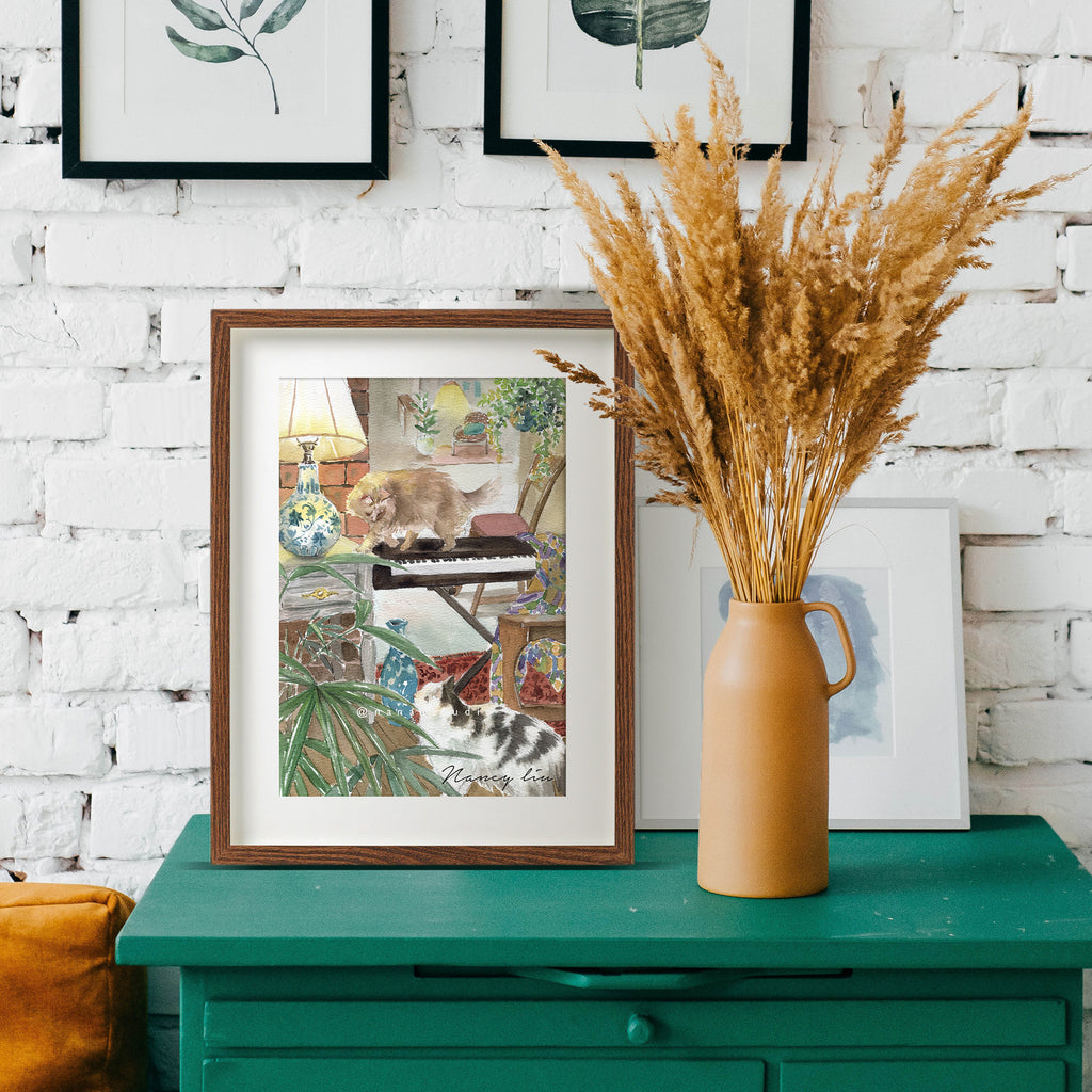Piano and Cats watercolour print displayed in a living room