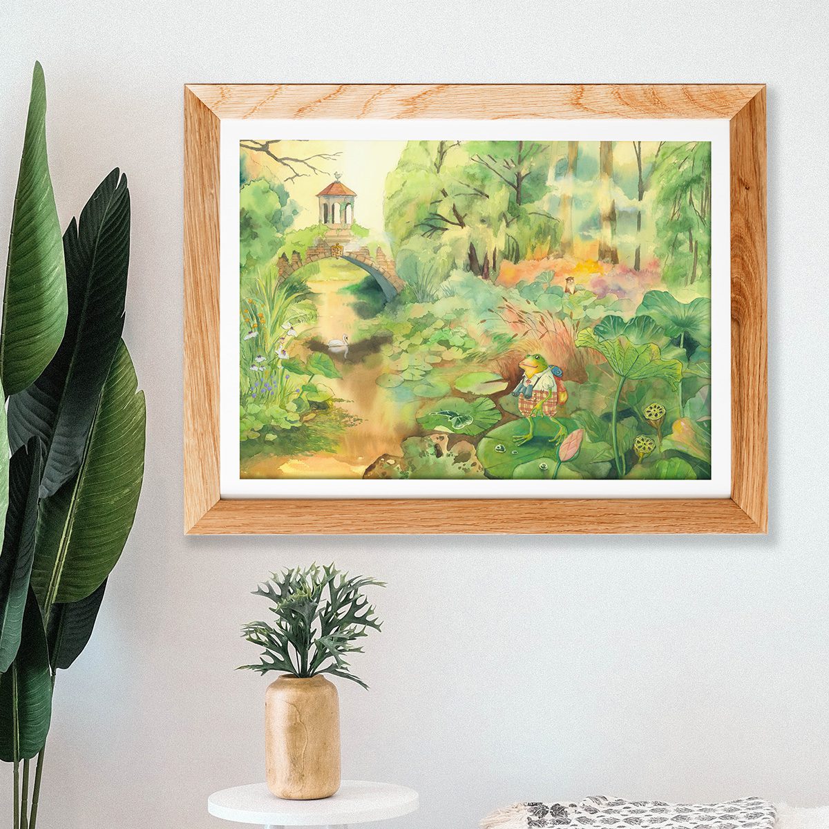 The Tale of Froggy print in a frame on a wall