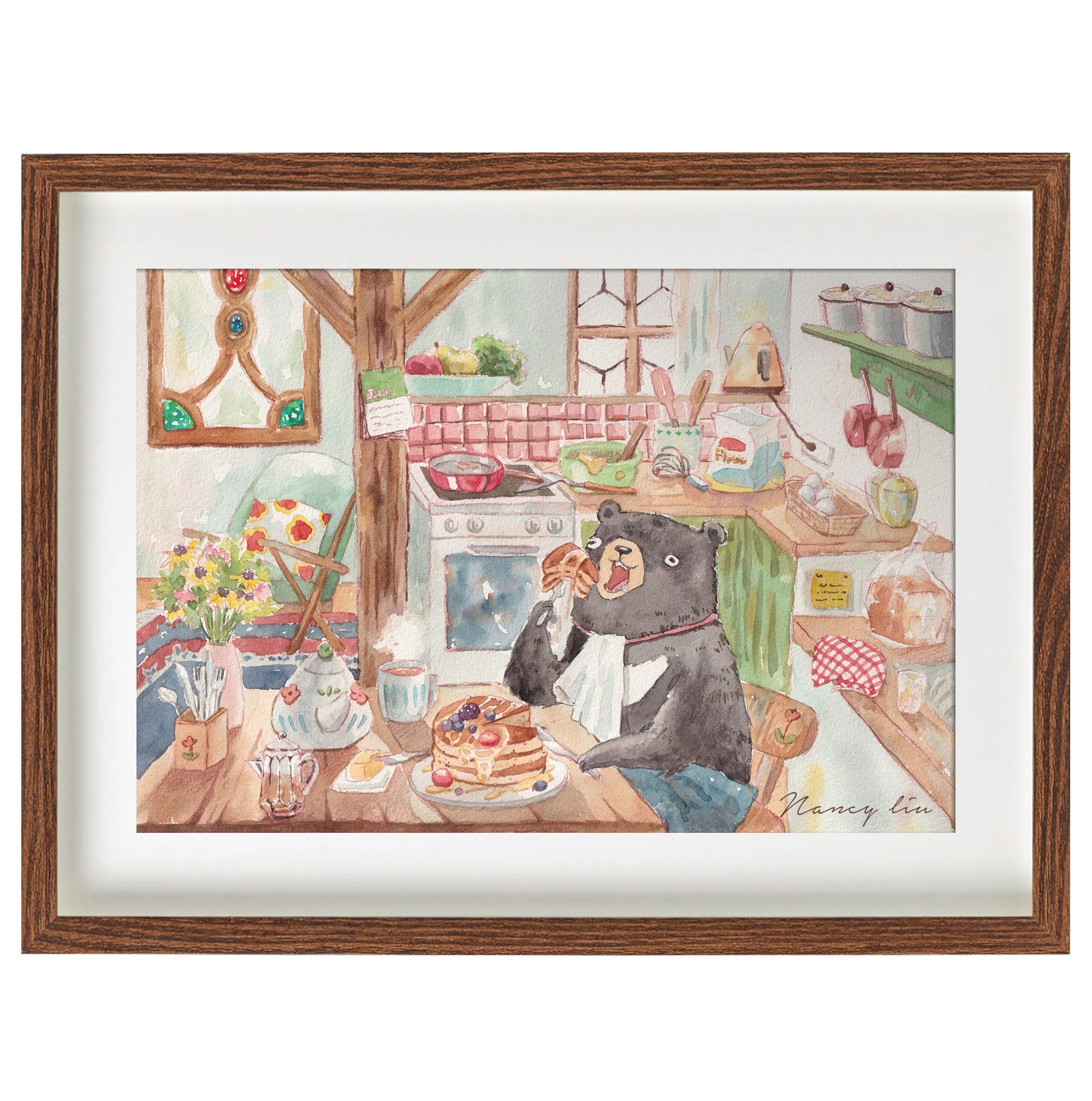 Bear making pancakes print framed on a kitchen wall