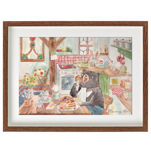 Bear making pancakes print framed on a kitchen wall