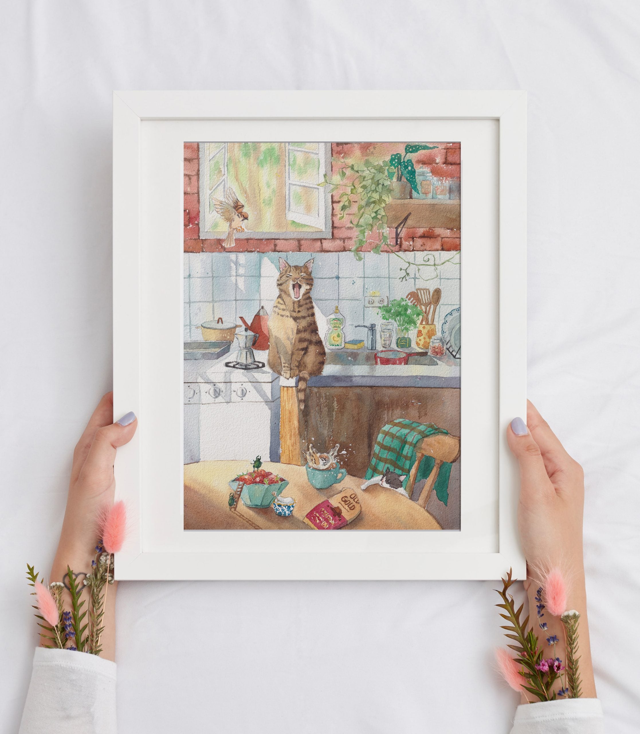 Detail of the kitten and chocolate in the When No One's Home watercolour print