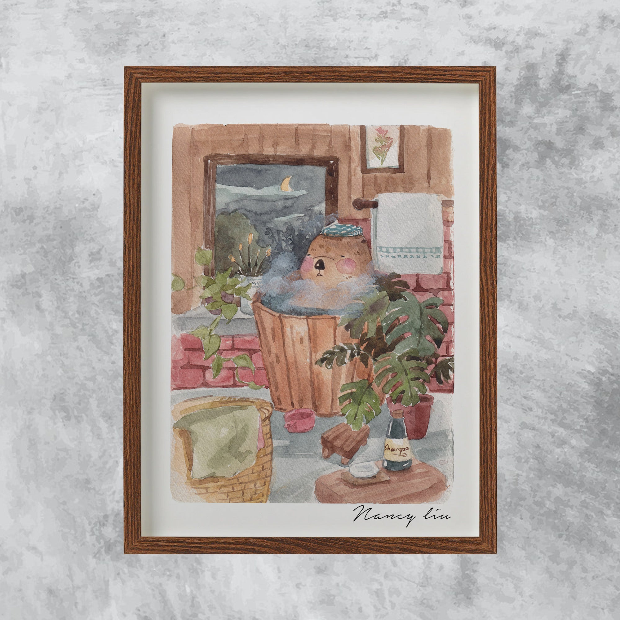 Mr. Otter bath print in a frame on a shelf