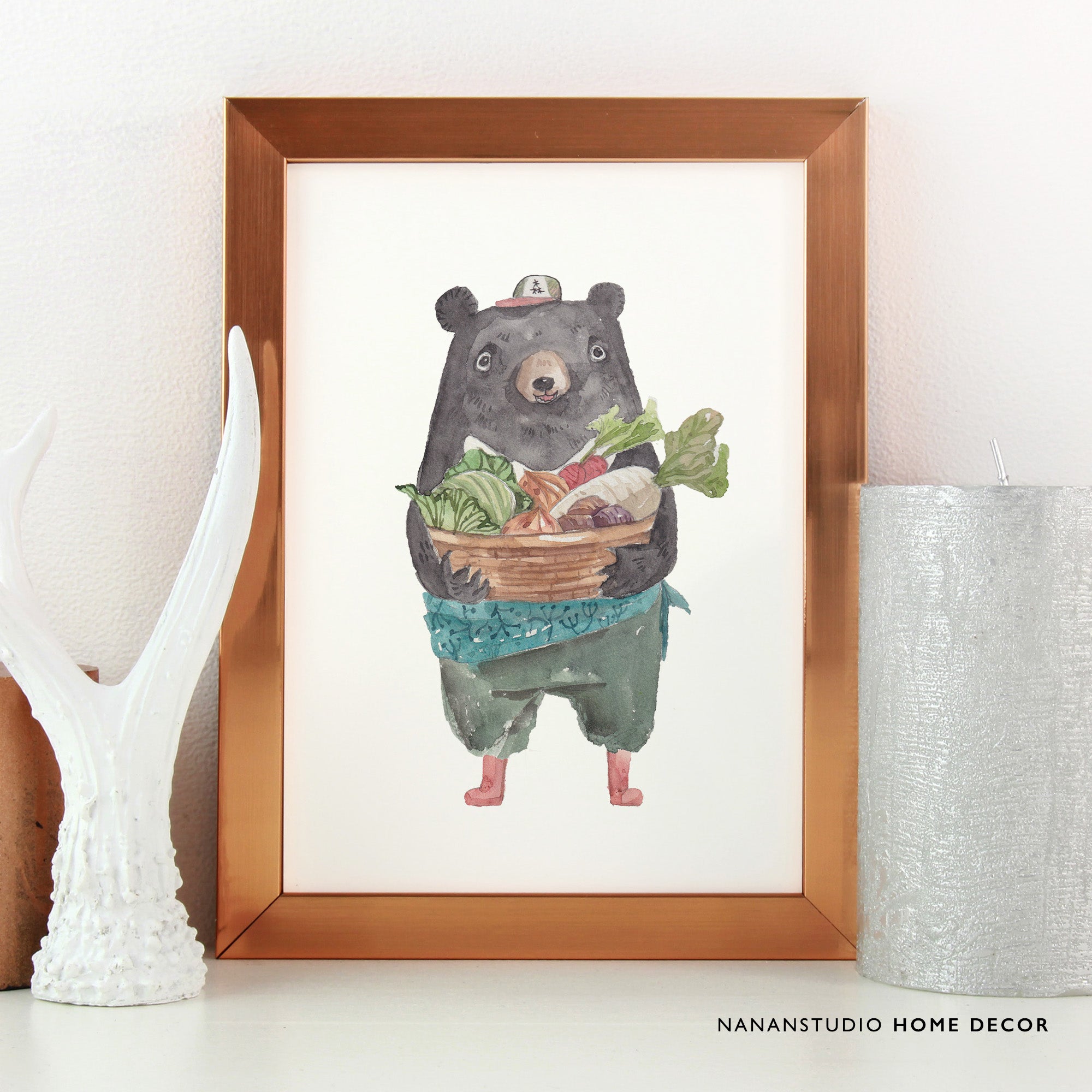 Principal Bear print held up to show scale